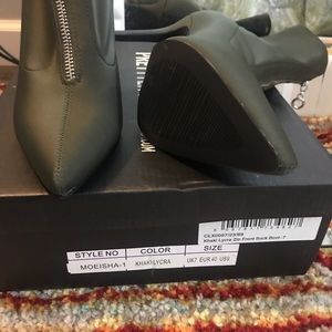 Green sock boots with a zipper